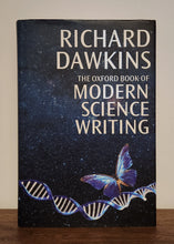 Load image into Gallery viewer, Book titled 'The Oxford Book of Modern Science Writing' by Richard Dawkins on a surface.